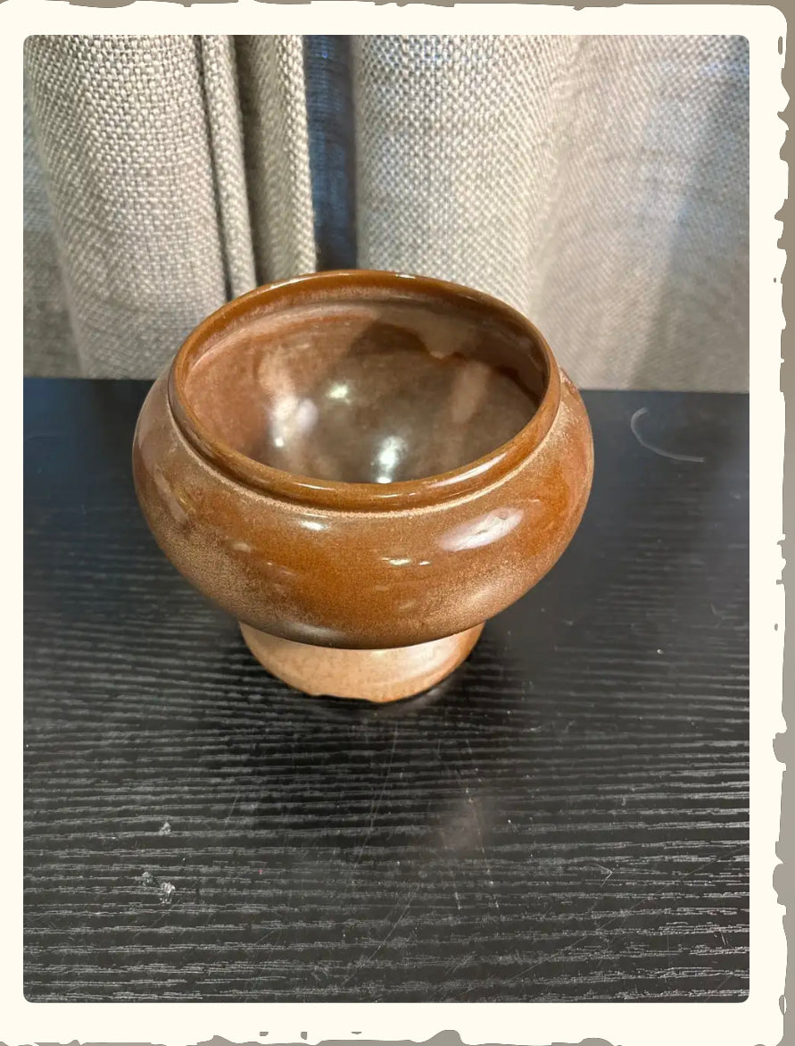 Vintage Frankoma Pottery 22S Brown Satin glazed footed bowl on dark wood surface